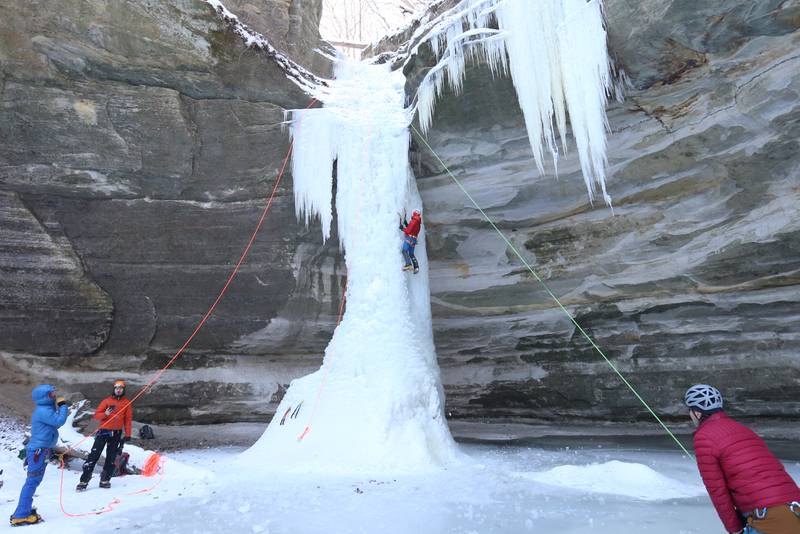 Gerry Voelliger of Bettendorf Iowa, climbs a 35-foot frozen waterfall in Ottawa Canyon at Starved Rock State Park on Friday, Jan. 19, 2024 in Starved Rock State Park. The waterfalls tend to freeze for a brief time during January at the State Parks. Climbers need to sign in and out at the front of the Park Maintenance Building across from the Visitor Center. Climbing is only allowed in 4 canyons at the park.