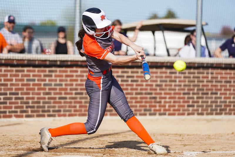 Minooka's Olivia Boyd singles against Oswego during a Southwest Prairie Conference softball game at Oswego High School on Wednesday, April 23, 2025.