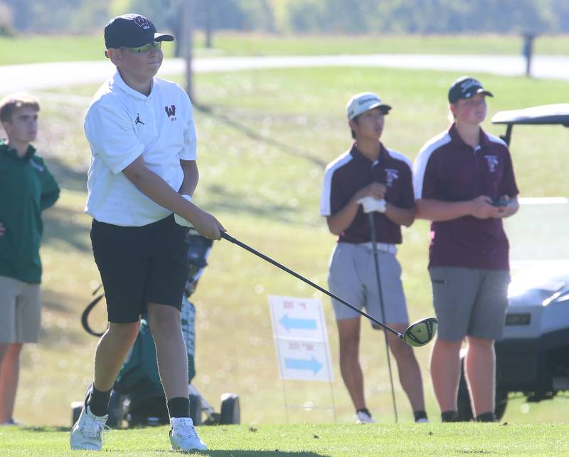Woodland's Hayden Marsinko tees off on the first hole during the Class 1A golf meet on Wednesday, Oct. 2, 2024 at Spring Creek Golf Course in Spring Valley.