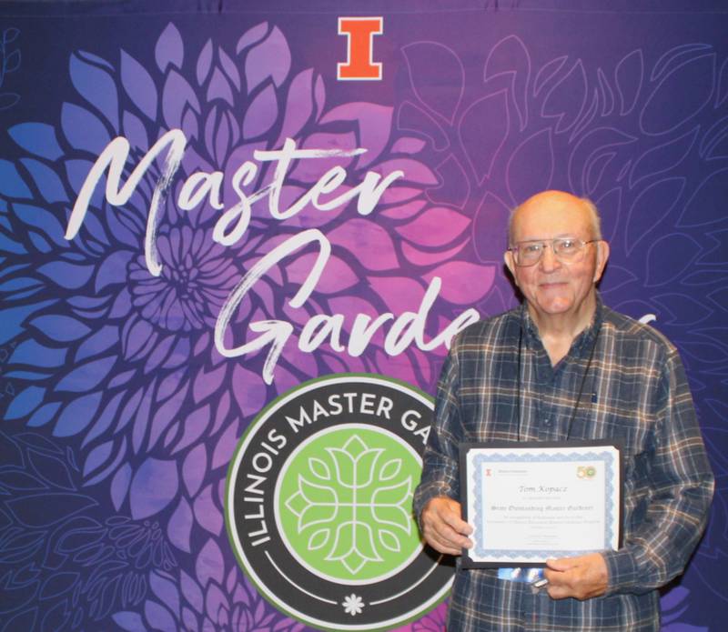 Tom Kopacz was honored at the 50th Anniversary Master Gardener Conference.