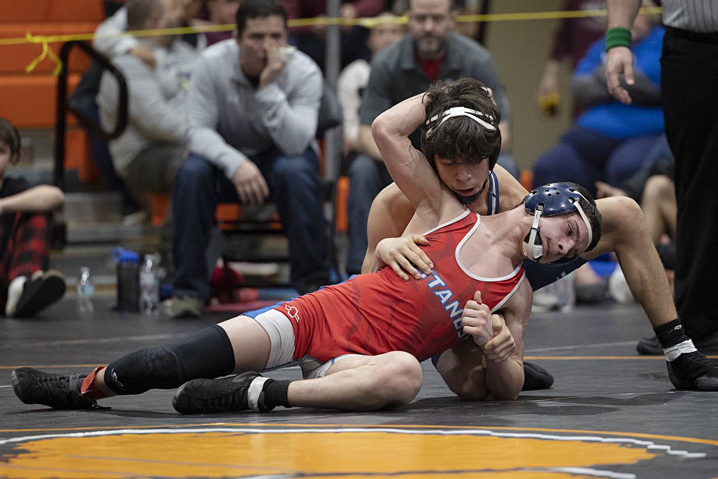 Marquette’s Wesley Janick works on Morrison’s Cael Wright in the 120 pound 3rd place match Saturday, Feb. 14, 2026, during the Class 1A wrestling sectionals in Byron.