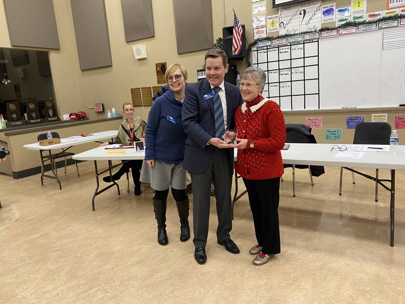 Karen Fisher accepts an award of recognition from the Illinois Association of School Boards for her 43 years as a board member among two difference school boards.