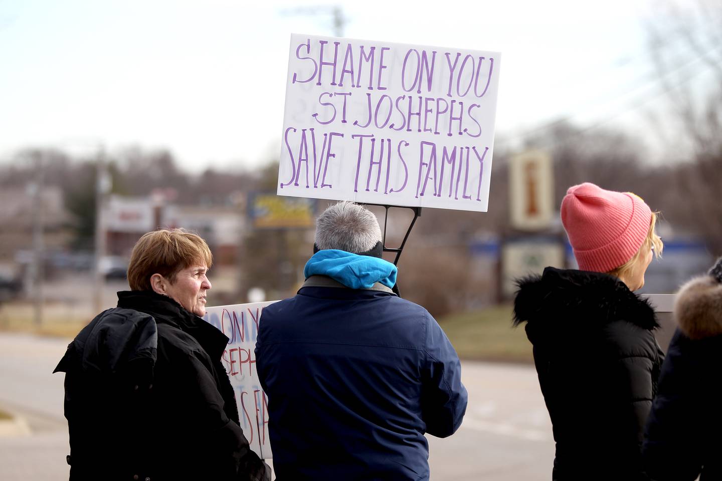 Community members, friends and family rally in honor of an Elgin couple fighting COVID-19 outside AMITA Health St. Joseph Hospital in Elgin on Wednesday, Dec. 22, 2021 after a Kane County judge denied a request to allow the drug Ivermectin be administered. Maria Abbinanti passed away in the early morning hours of Wednesday, Dec. 22, 2021 and her husband, Sebastian, is still hospitalized.