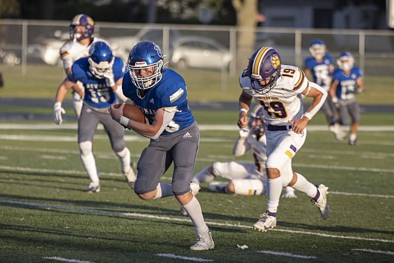 Newman’s Daniel Kelly runs back an interception against Sherrard Saturday, Sept. 2, 2023 in a game at Sterling High School. Newman picked off two passes in the first half.