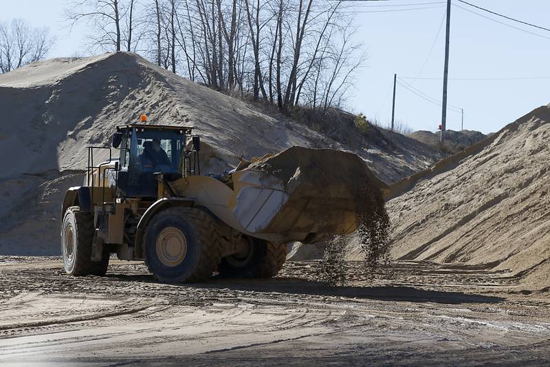 Sand is loaded into a truck Friday, Feb. 10, 2023, at Thelen Sand and Gravel, 28955 W. Route 173 in Fox Lake.