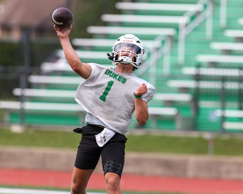York quarterback Bruno Massey unleashes a pass at York High School first day of football practice. Aug 12, 2024.