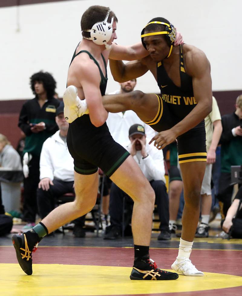 Crystal Lake South’s Aiden Marrello takes down Joliet Wes’s Aiden Brown tduring a165-pound match in the Tom DuBois Invite wrestling meet on Saturday, Dec. 13, 2025, at Richmond-Burton High School in Richmond.
