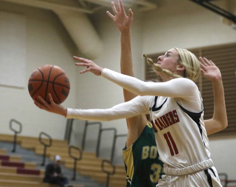 Huntley's Anna Campanelli drives to the basket against Boylan's Lily Esparza during a Dundee-Crown Thanksgiving Girls Basketball Tournament basketball game Wednesday, Nov.. 16, 2022, between Huntley and Boylan at Huntley High School.