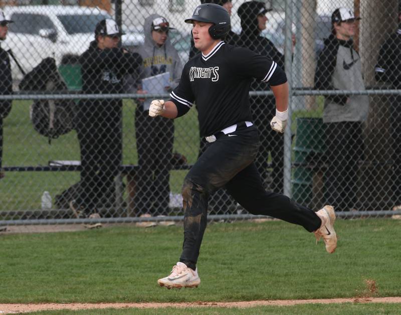 Kaneland's Collin Miller runs to home to score the teams first run against L-P on Wednesday, April 5, 2023 at Dickinson Field in Oglesby.
