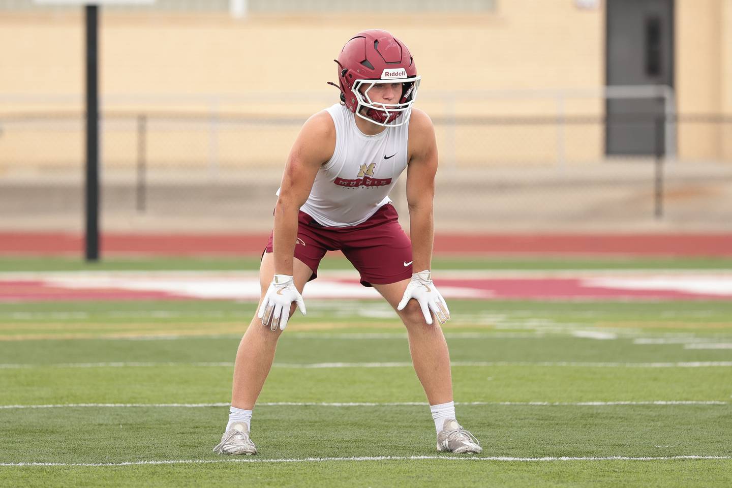 Morris' Caeden Curran waits for the snap against Romeoville at Morris' 7-on-7 scrimmage on Tuesday, July 8, 2025 in Morris.