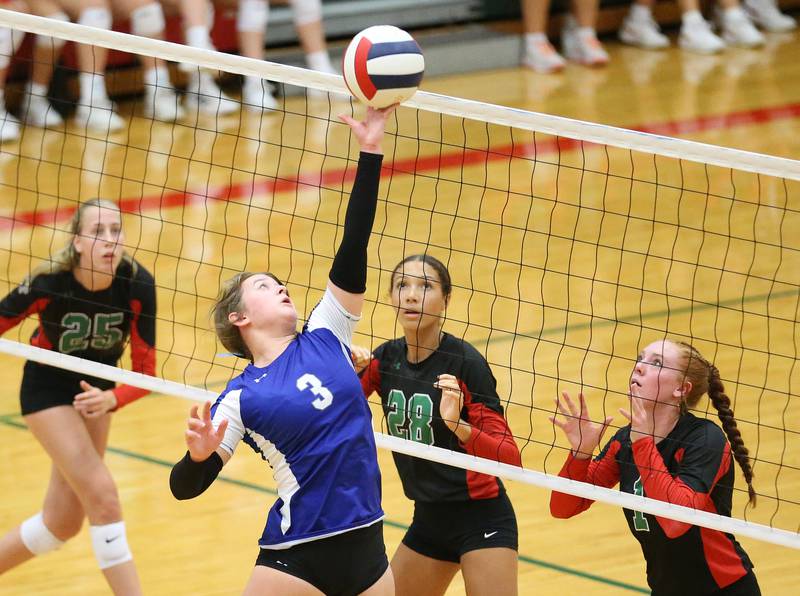 Princeton's Natasha Faber-Fox sends the ball past L-P players Addison Urbanski, Ava Currie and Addison Duttlinger on Tuesday, Aug. 22, 2023 in Sellett Gymnasium.