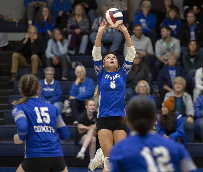 Newman’s Brooklyn Smith sets the ball against Hall Tuesday, Oct. 21, 2025.