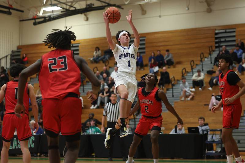 St. Francis’ Niko Quaranta goes in for the shot against Bolingbrook in the Jack Tosh 2023 Holiday Classic on Wednesday, Dec.27th, 2023 in York.
