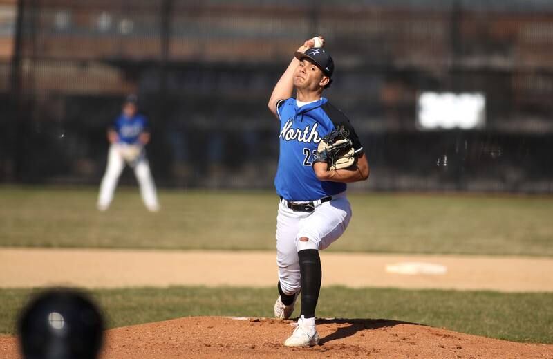 St. Charles North’s Anthony Estrada pitches against Wheaton Warrenville South during a home game on Monday, April 10, 2023.