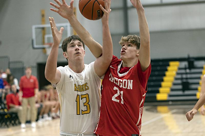 AFC’s Brock Lehman and Oregon’s Tucker O’Brien fight for a rebound Wednesday, Nov. 29, 2023 in Ashton.