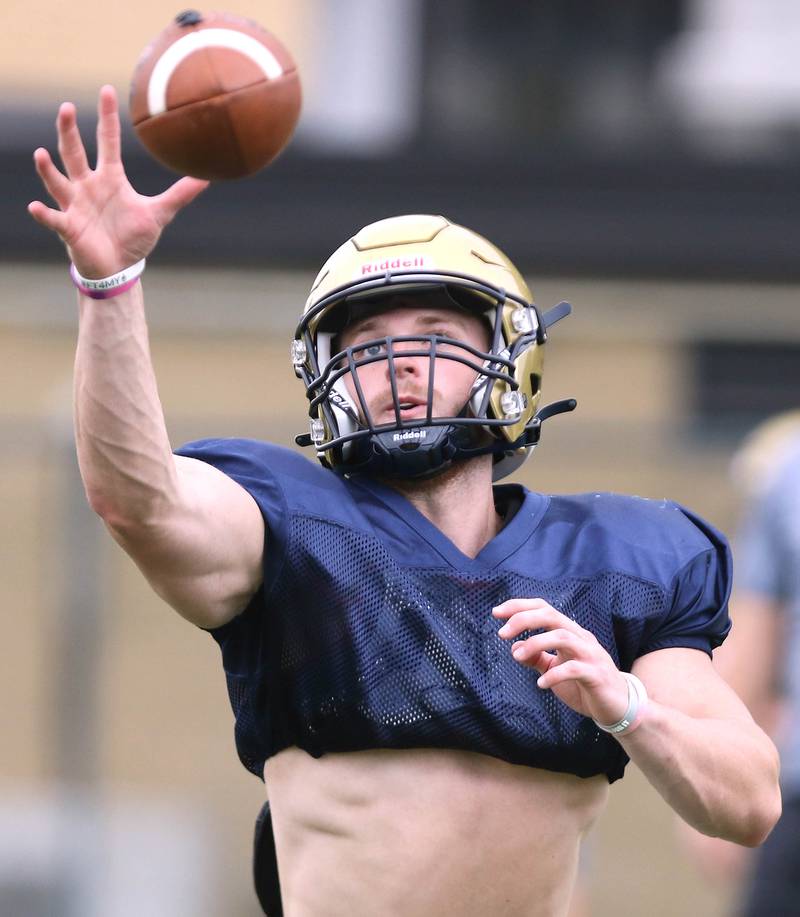 Hiawatha’s Lucas Norvell makes a one-handed catch during practice Wednesday, August 9, 2023, at the school in Kirkland.