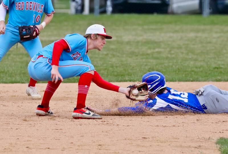 Hall short stop Ethan Plym puts the tag on Princeton's Ryan Brucker on a stolen base attempt Monday at Prather Field.