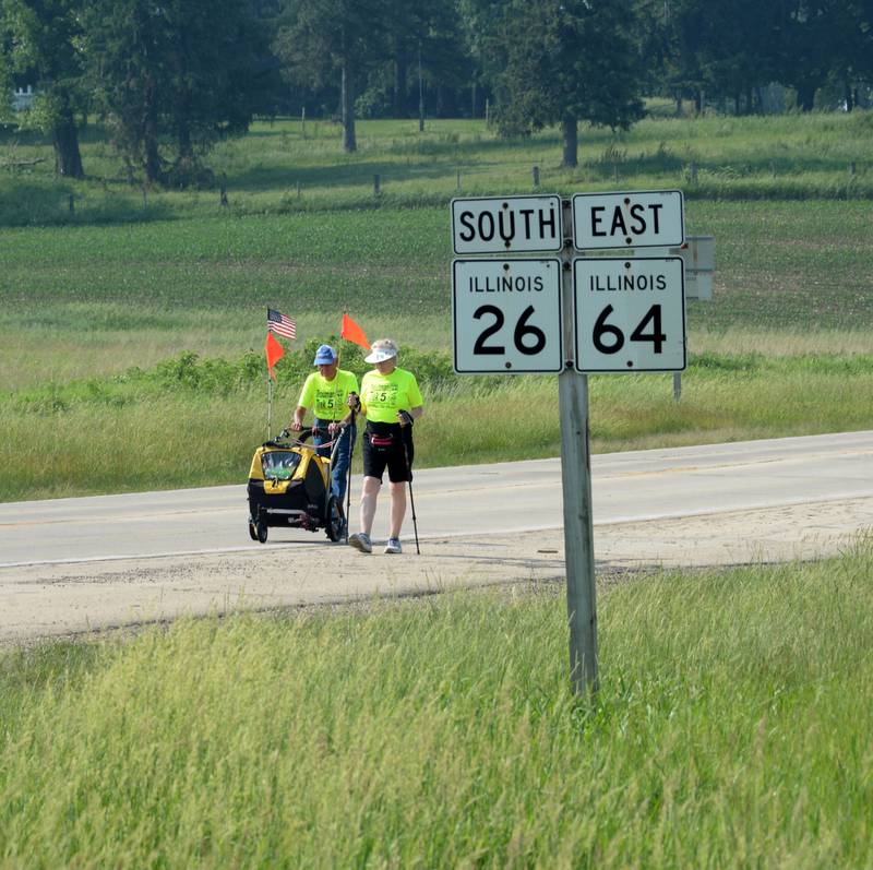 Dean Troutman and Kathy Woodward walk along Illinois 26, between Forreston and Polo on Sunday, June 4. Troutman, 92, of Princeville, Illinois, is walking to raise money for St. Jude's. Woodward of Galesburg, walked with Troutman from Dixon to Forreston. Her husband, Gene, followed them in the couple's vehicle. Woodward returned home on Sunday. Troutman his trek by himself, but invites others to join him during his daylight hours.