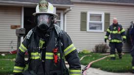 Two people rescued from house fire in Woodstock