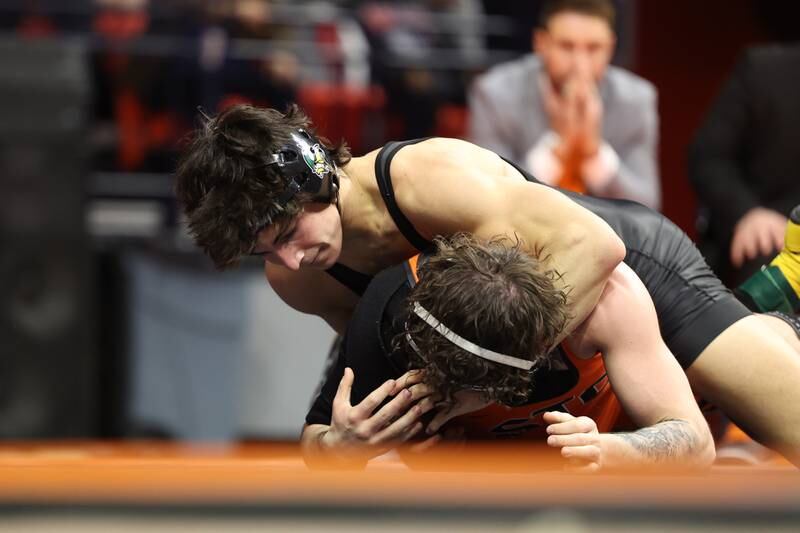 Fremd’s Evan Gosz St. Charles East’s Jayden Colon in the 144-pound Class 3A state championship match on Saturday, Feb. 17th, 2024 in Champaign.
