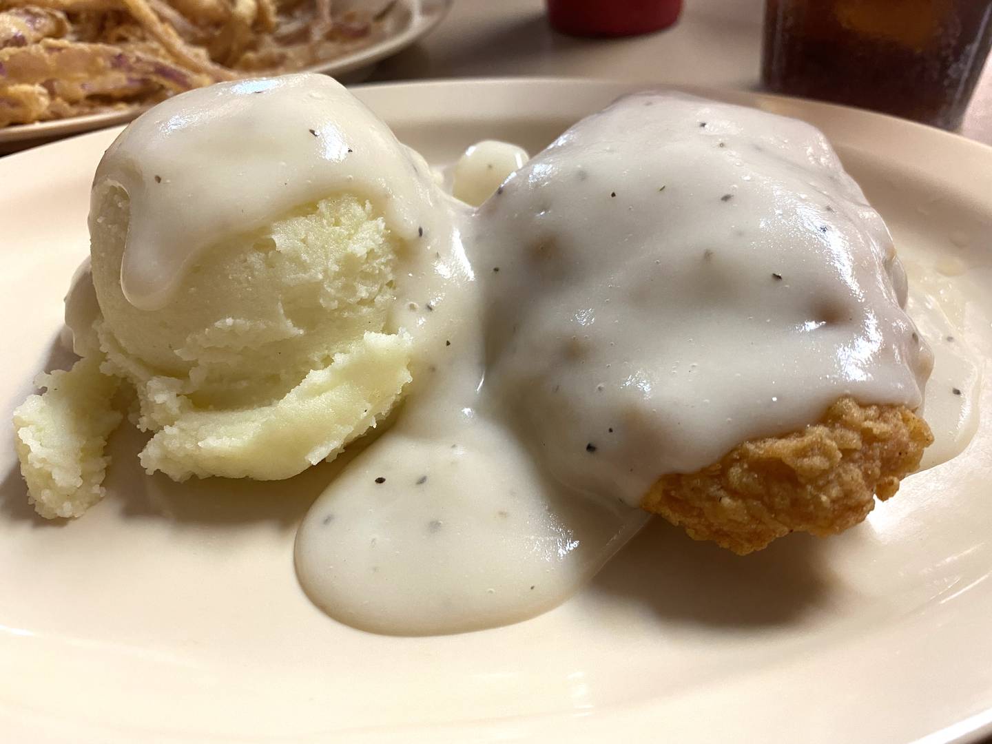 The country-fried chicken breast smothered in gravy is juicy and, like many of the meals at Victoria's Country Diner, hearty.