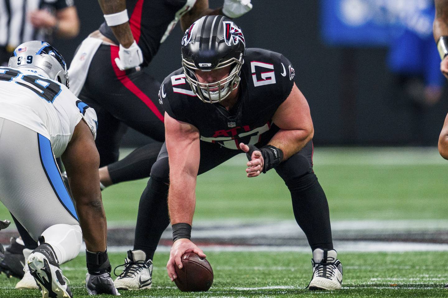 Atlanta Falcons center Drew Dalman (67) lines up during the first half of an NFL football game against the Carolina Panthers, Sunday, Jan. 5, 2025, in Atlanta. The Panthers defeated the Falcons 44-38. (AP Photo/Danny Karnik)