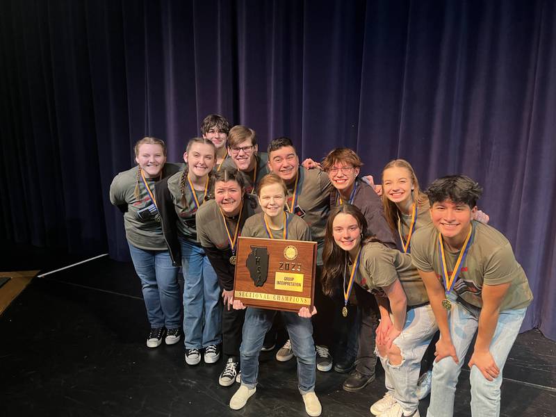 Members of the Sterling High School cast of "8-Bit Christmas" hold the IHSA sectional plaque for  taking first in the group interpretation portion of Saturday's drama competition.  Cast members are, in no particular order, Emma Stroup, Kaidence Stroup, Avery Moran, Rileigh Wren, Brinley Francis, Anna Hutchison, Kyle Hutchison, Israel Grande, Gavin Fischer, Owen Gaffey, and Ashton Stange.