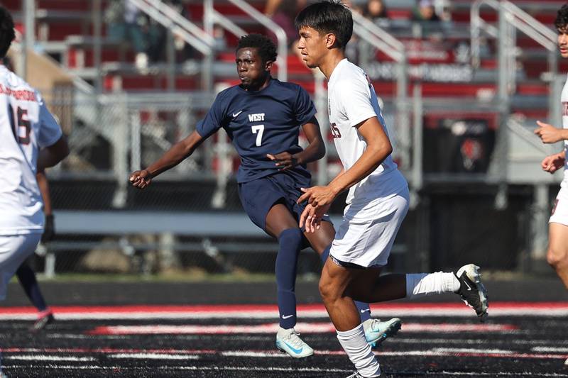 West Aurora’s Power Selemani eyes his shot into the net against Bolingbrook in the Class 3A Bolingbrook Regional championship match on Saturday, Oct. 26, 2024 in Bolingbrook.