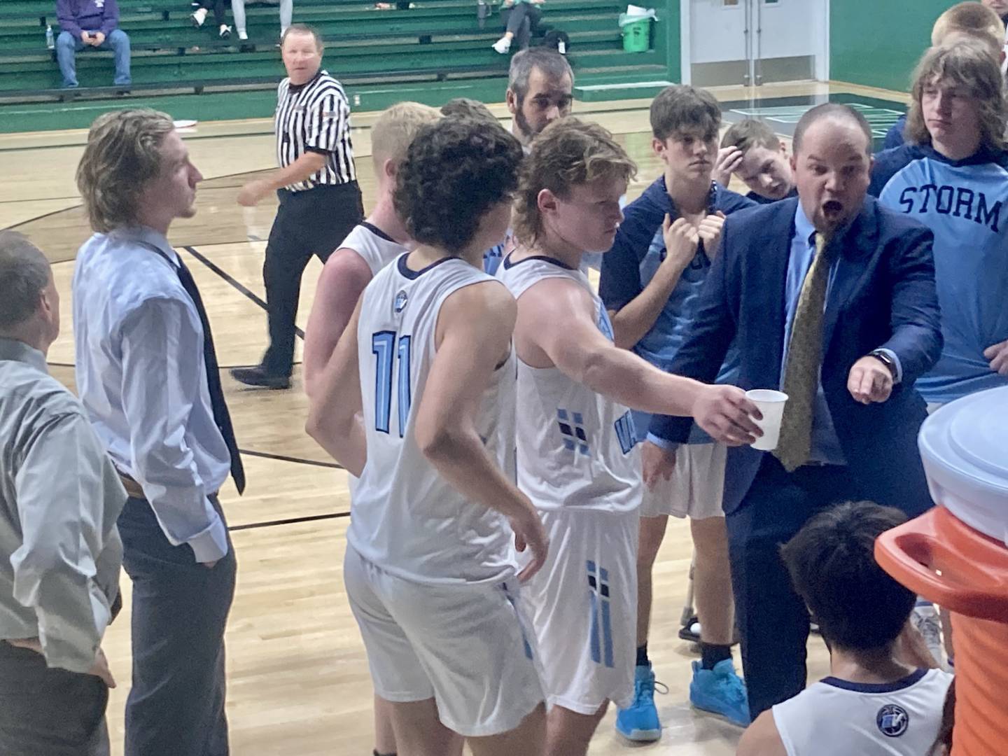 Bureau Valley coach Jason Marquis makes a point during a timeout during Wednesday's game with Putnam County. The Storm won 50-38 to improve to 2-1.