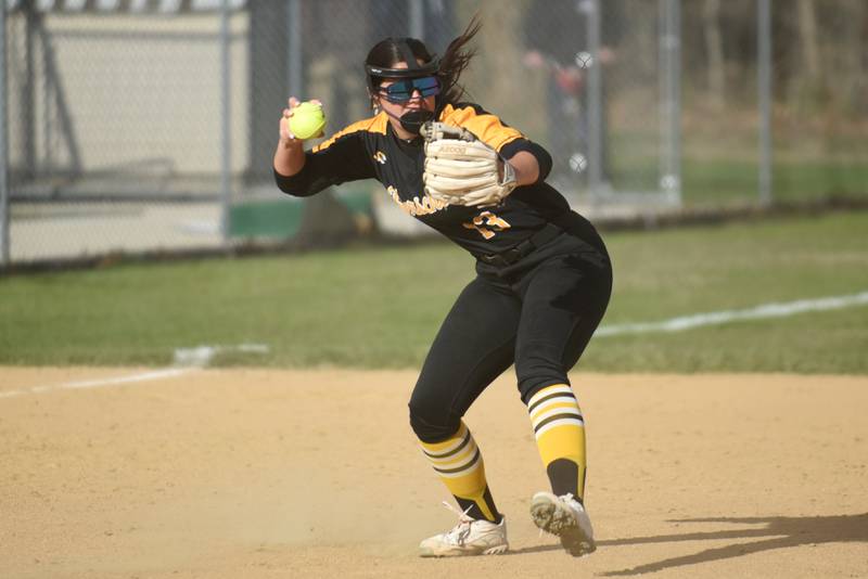 Herscher's Chloe Kinkade steps and throws to first base during a game at Wilmington Tuesday, April 15, 2025.