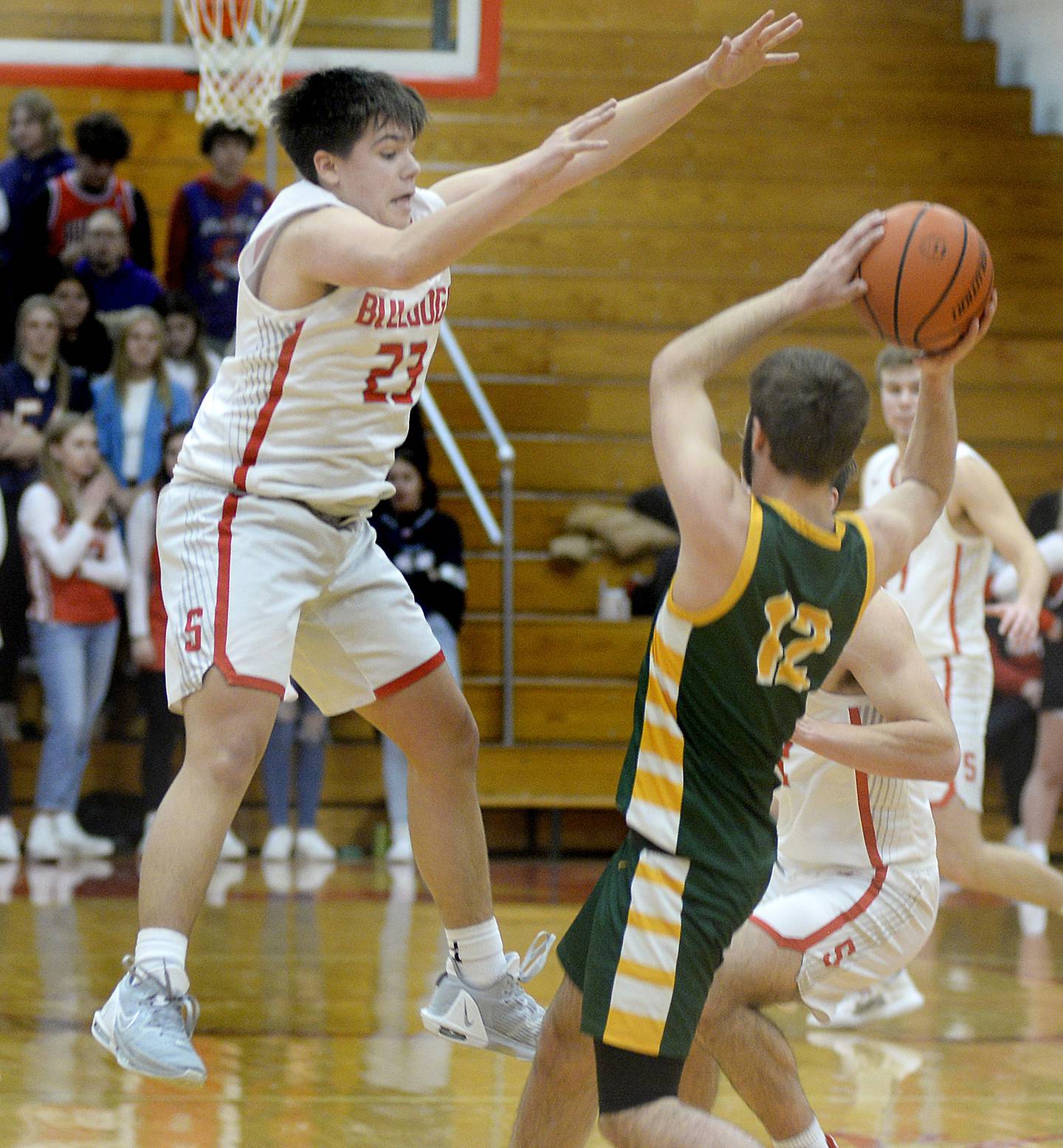 Streator’s Logan Aukland goes aerial to block a pass by Coal City’s Carson Shepard in the 2nd period on Tuesday, Jan. 31, 2023 at Streator High School.