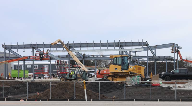 Crews build the exterior shell of the Dr. Alfred E. Wisgoski Agricultural Education Center on Tuesday, Jan. 13, 2026 on the south end of Illinois Valley Community College campus in Oglesby. Last August, IVCC officially broke ground on the $7.6 million Dr. Alfred E. Wisgoski Agricultural Education Center. The 10,250-square-foot facility is expected to open in 2027. The project is supported by a $3.5 million grant from the U.S. Department of Economic Development Administration, a $240,000 grant from the Illinois Department of Commerce and Economic Opportunity and a $1 million gift from the Wisgoski family.