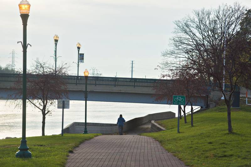 The pedestrian bridge will join the bike path that runs along the north bank of the river near the YMCA and the high school.