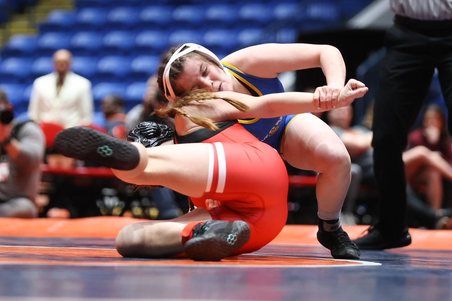 Smonauk’s Shea Reisel rolls Jacksonville’s Brooklyn Murphy in the 110 pound championship match at Grossinger Motor Arena in Bloomington. Saturday, Feb. 26, 2022, in Champaign.