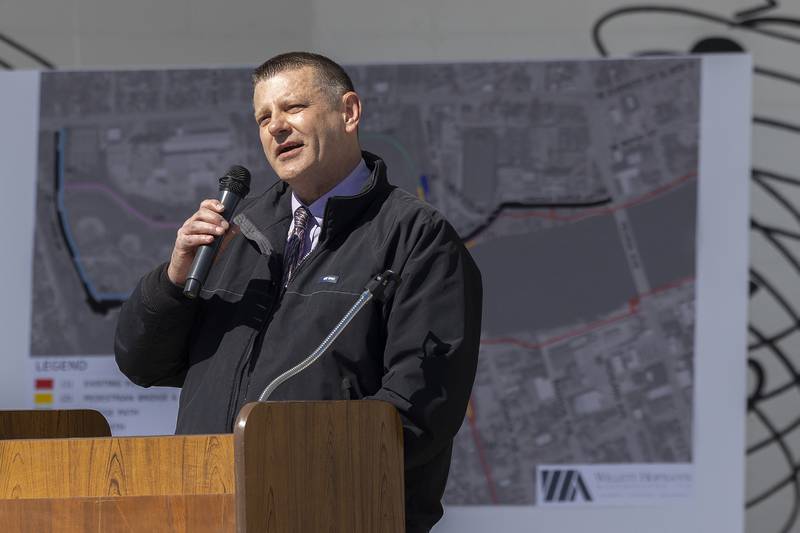 Shawn Ortgiesen, Engineer of Local Roads for District 2, talks about the construction of the pedestrian bridge Tuesday, April 8, 2025, for the start of Project Rock in Dixon.