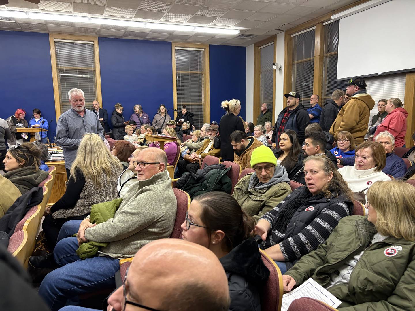 Opponents of a proposed Woodstock gravel pit pack Woodstock City Hall before a Woodstock Plan Commission meeting Jan. 15, 2026. The meeting was then moved to the Opera House to accommodate the overflow crowd.