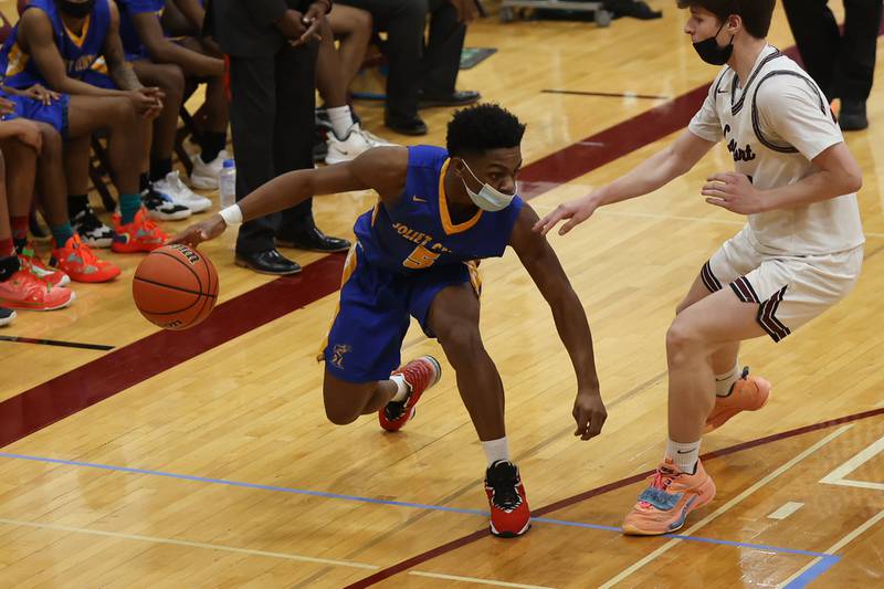 Joliet Central’s Anthony Lee makes a play against Lockport. Monday, Jan. 31, 2022 in Lockport.