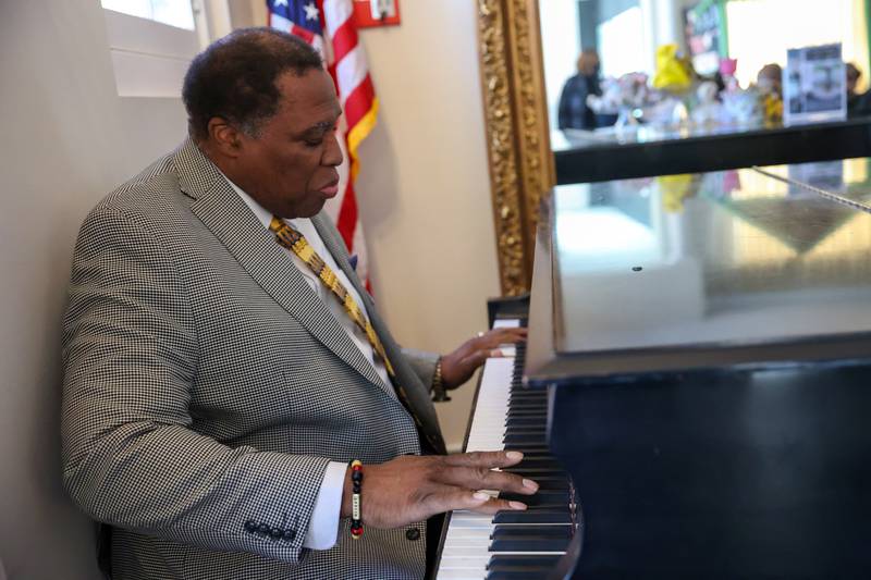 Robert Ellington-Snipes, of Kankakee, joins in a gospel performance on the piano during the opening of the exhibit 'Called to Kankakee: The Life and Legacy of the Rev. William H. Copeland Jr.' at the Kankakee County Museum on Saturday, Feb. 7, 2026.