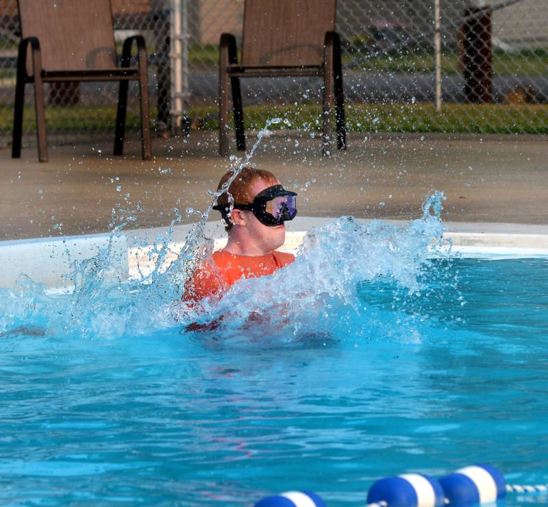Cale Utter, 14, of Polo, make a splash as he dives into the Polo Swimming Pool on Tuesday evening. The outdoor pool, located at 303 E. Webster Street, is one of the last remaining public pools in the area. Call 815-946-3406 for schedule information.