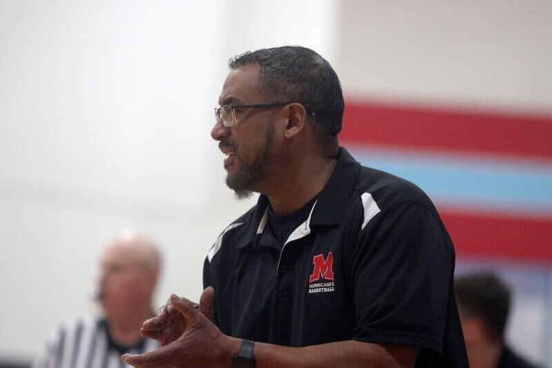 Marian Central’s Head Coach Lee Brown guides the Hurricanes to a win over Rockford Guilford in varsity girls basketball Saturday at Landers Pavilion on the campus of Marian Central High School in Woodstock.