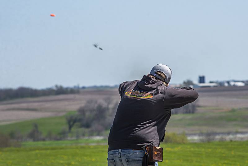 Prophetstown clay shooting team member Kyle Skromme fires off his shot Saturday, May 7, 2022. You can see the shot and wadding on a pathway to the bird. Along with Morrison, several other high school teams use the club for their competitions.
