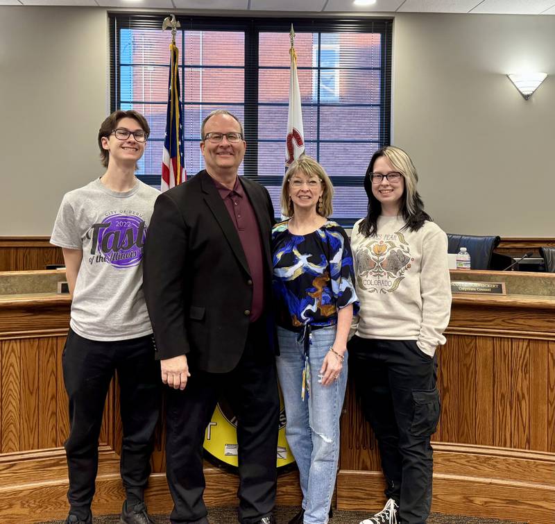 Peru Mayor Ken Kolowski with his wife Michelle, his son Conner and his daughter Macy after he was sworn in for a second term. His oldest daughter Alex was not present.