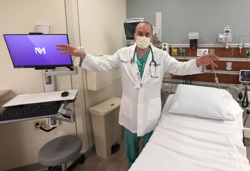 Dr. Jeremy Silver, medical director in the emergency department at Northwestern Medicine Kishwaukee Hospital, talks about the layout of one of the emergency room bays Monday, March 28, 2022, in the recently completed phase 2 of the three-phase renovation project in the ER at the facility.