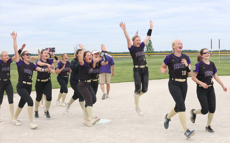Members of the Serena softball team react as they accept the Class 1A Regional plaque after defeating Marquette 2-1 on Friday, May 22, 2026 at Serena High School.