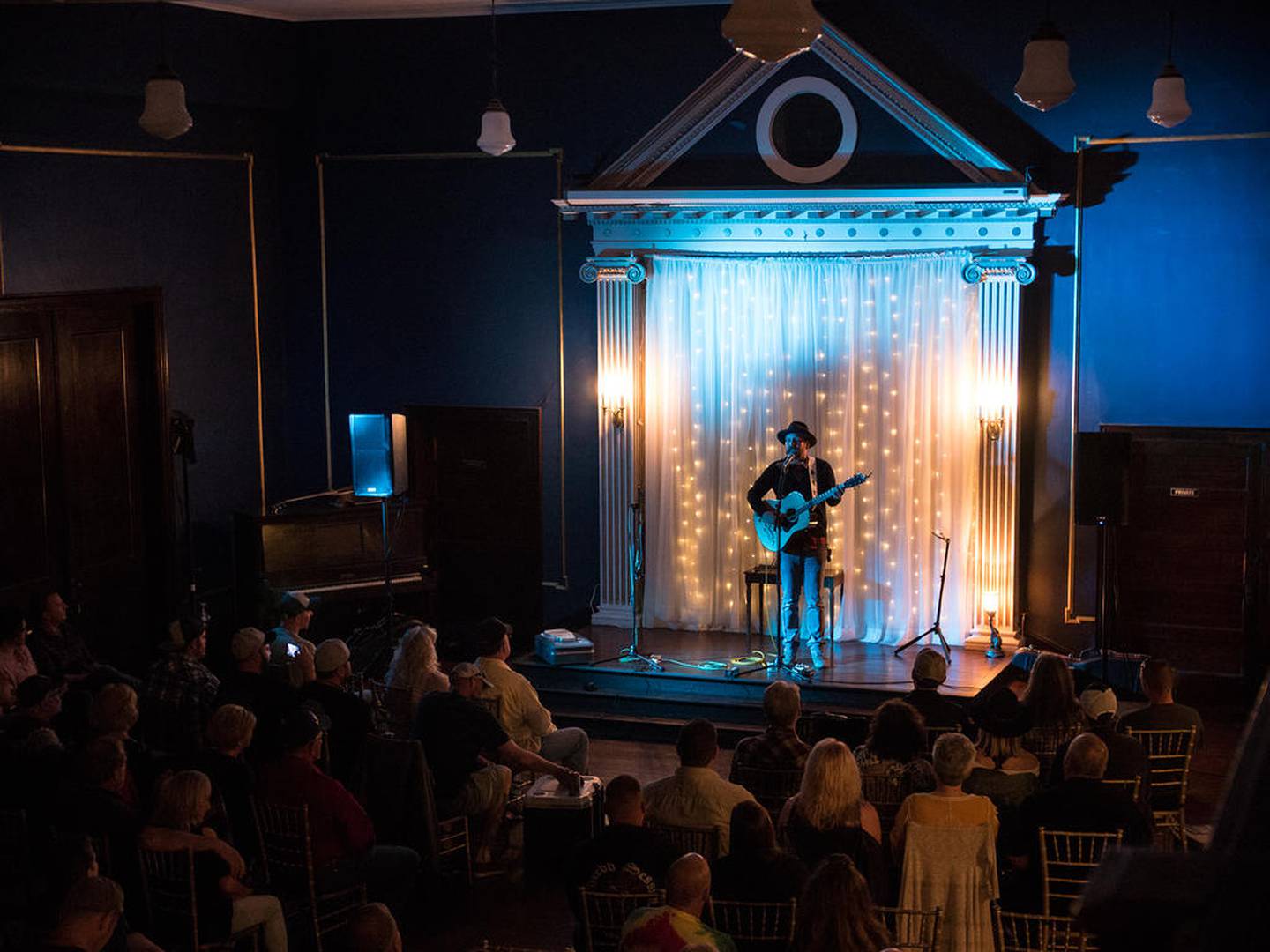 A musician performs at The 122 Club, located in a former Masonic Lodge in Streator.