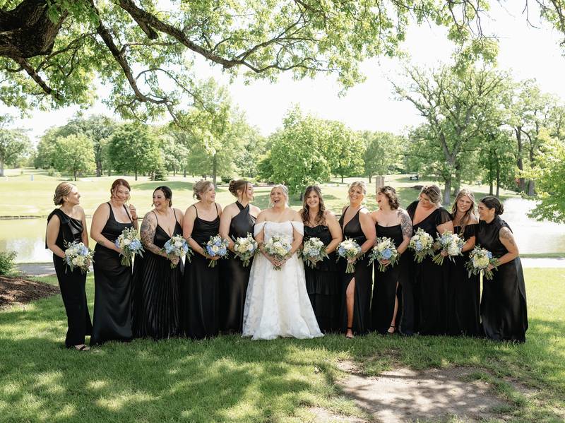 Kyle and Josie Quick, who currently live in Mark, were married at Senica’s Oak Ridge on May 24, 2005. Josie spent some time with her wedding party during her big day.