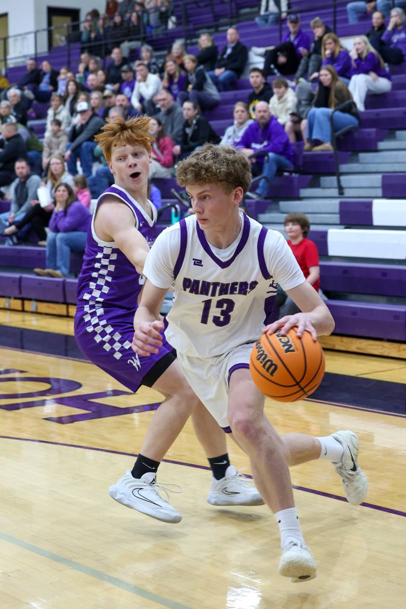 Manteno's Ramsey Owens drives to the lane against Wilmington's Quinn Campbell during Wilmington's 60-35 victory over Manteno on Tuesday, Feb. 17, 2026.a