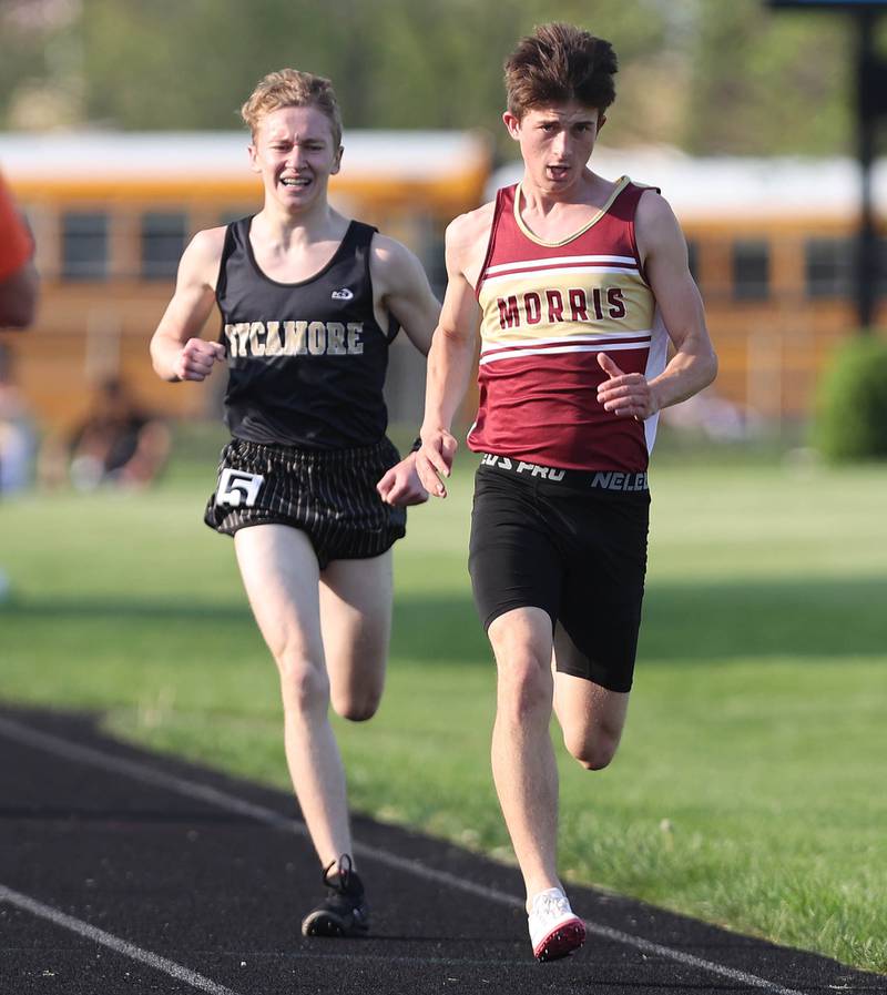 Morris' Kaden Welch and Sycamore's Ethan Solfisburg finish the 3200 meter run Friday, May 13, 2022, during the Interstate 8 Conference Championship meet at Sycamore High School.