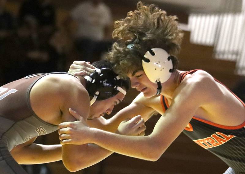 Jacobs’ Nathan Gomez, left, battles Crystal Lake Central’s Richie Butler at144  pounds in varsity wrestling on Thursday, Jan. 16, 2025, at Jacobs High School in Algonquin.