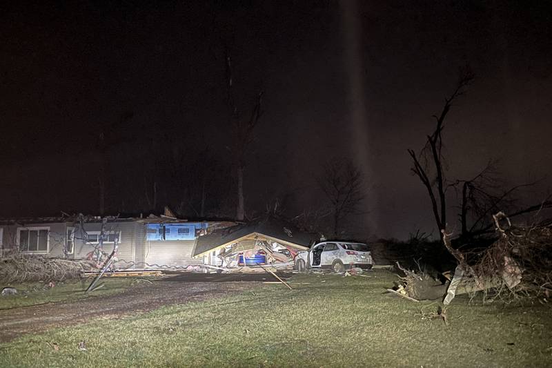Damage is seen along South Sandbar Road in Aroma Park after severe thunderstorms and a tornado passed through the area on March 10, 2026.